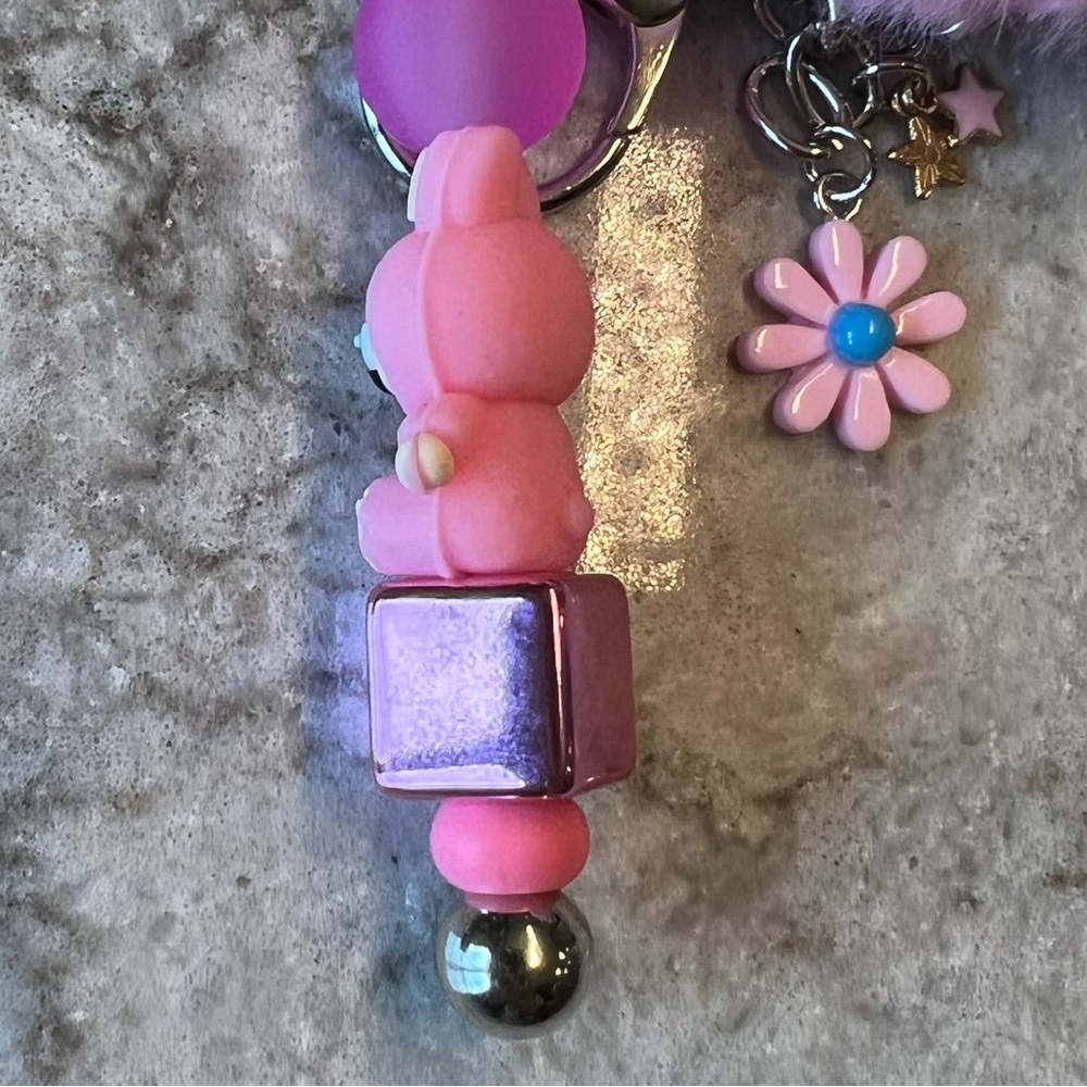 Pink Silicone Labubu Keychain with Pom Pom and Floral Accent - Picture 7 of 8